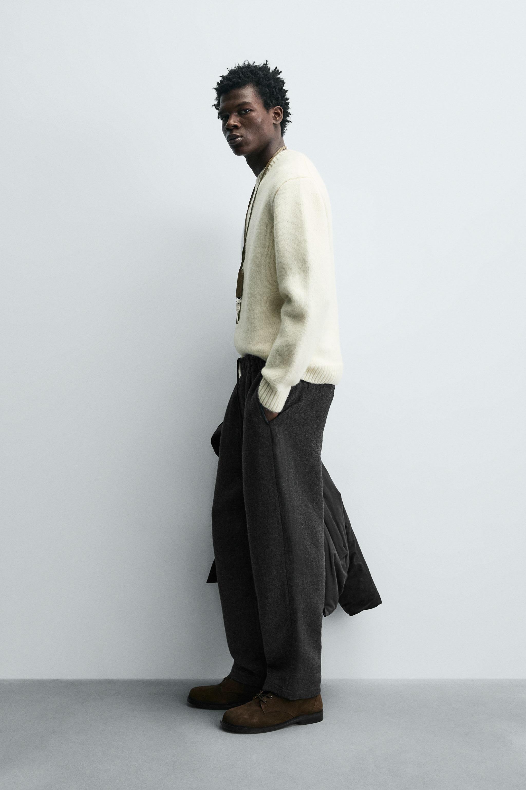 PLEATED WOOL PANTS